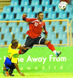 T&T vs St Vincent in Caribbean football action.